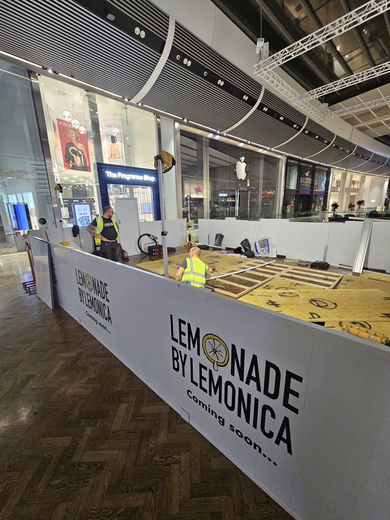 Lemonade by Lemonica site hoarding at Westfield Stratford before the kiosk build starts
