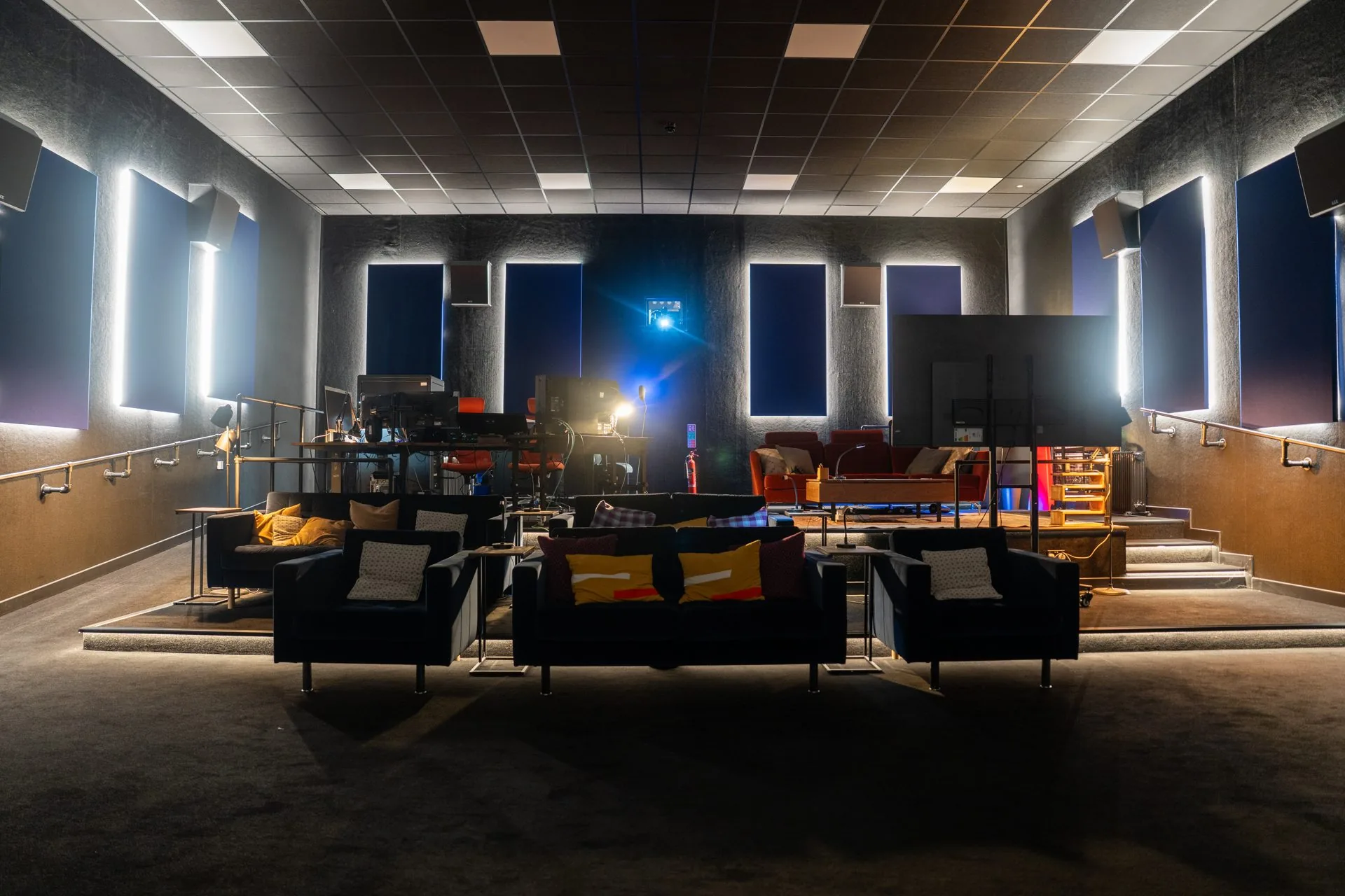 Completed Gelert Post Production Studio in Cardiff with blue acoustic panels and production workstations