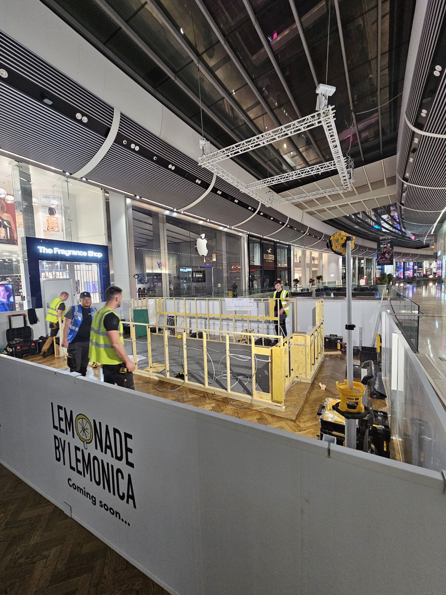 Kiosk setting out behind the hoarding at Westfield Stratford during the Lemonica build