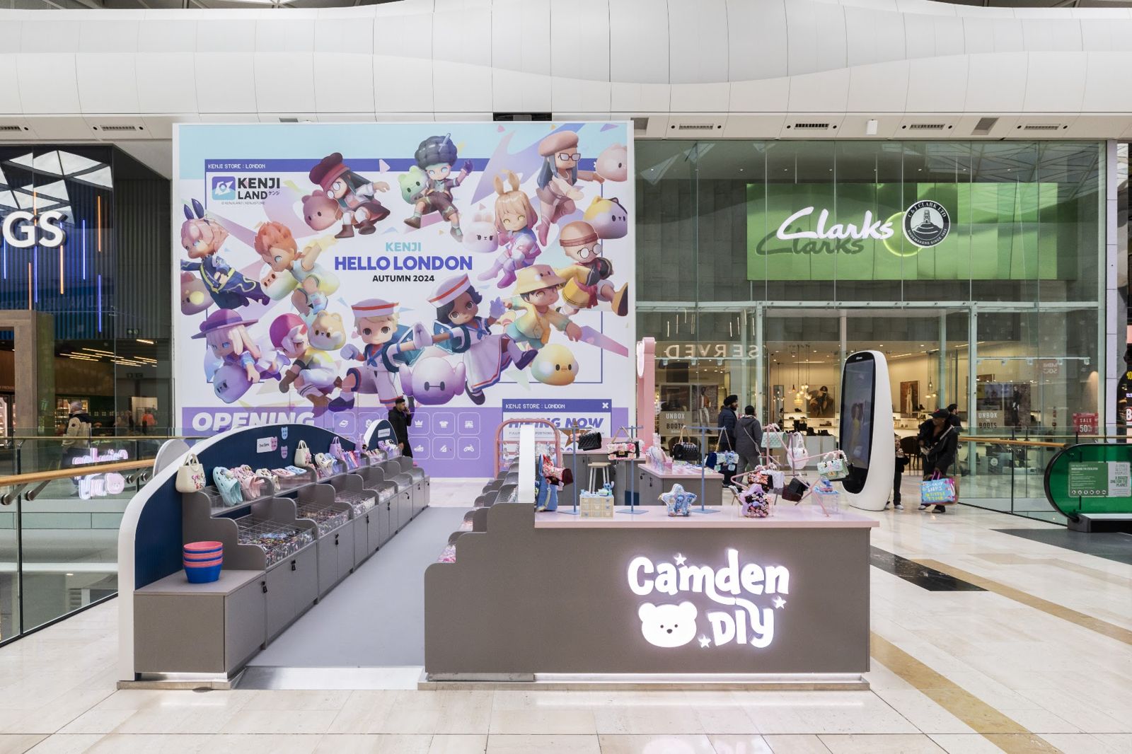 Camden DIY illuminated accessories kiosk at Westfield London with backlit signage built by OLLYWOOD
