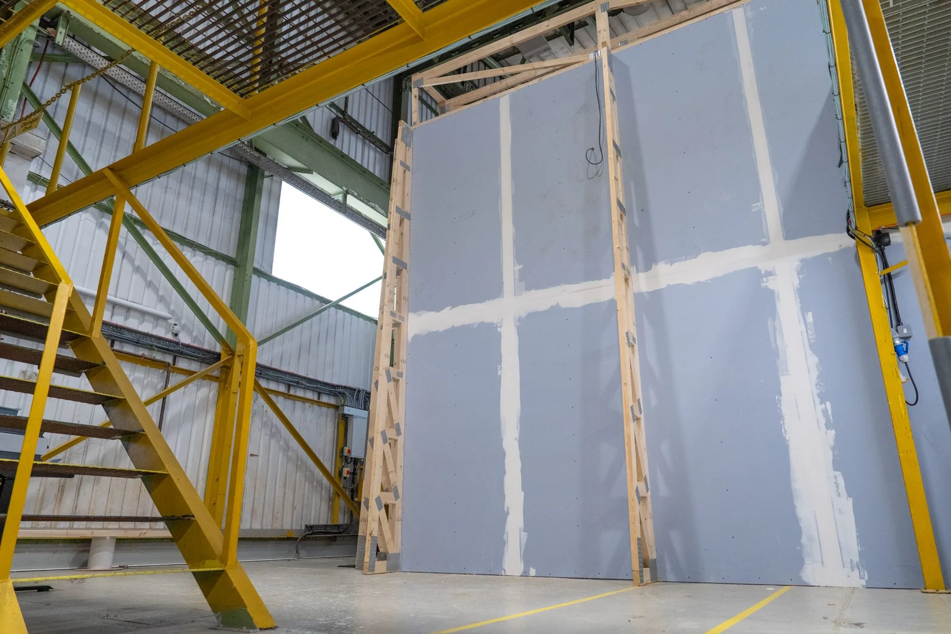 Isolated Gelert studio structure inside its industrial warehouse