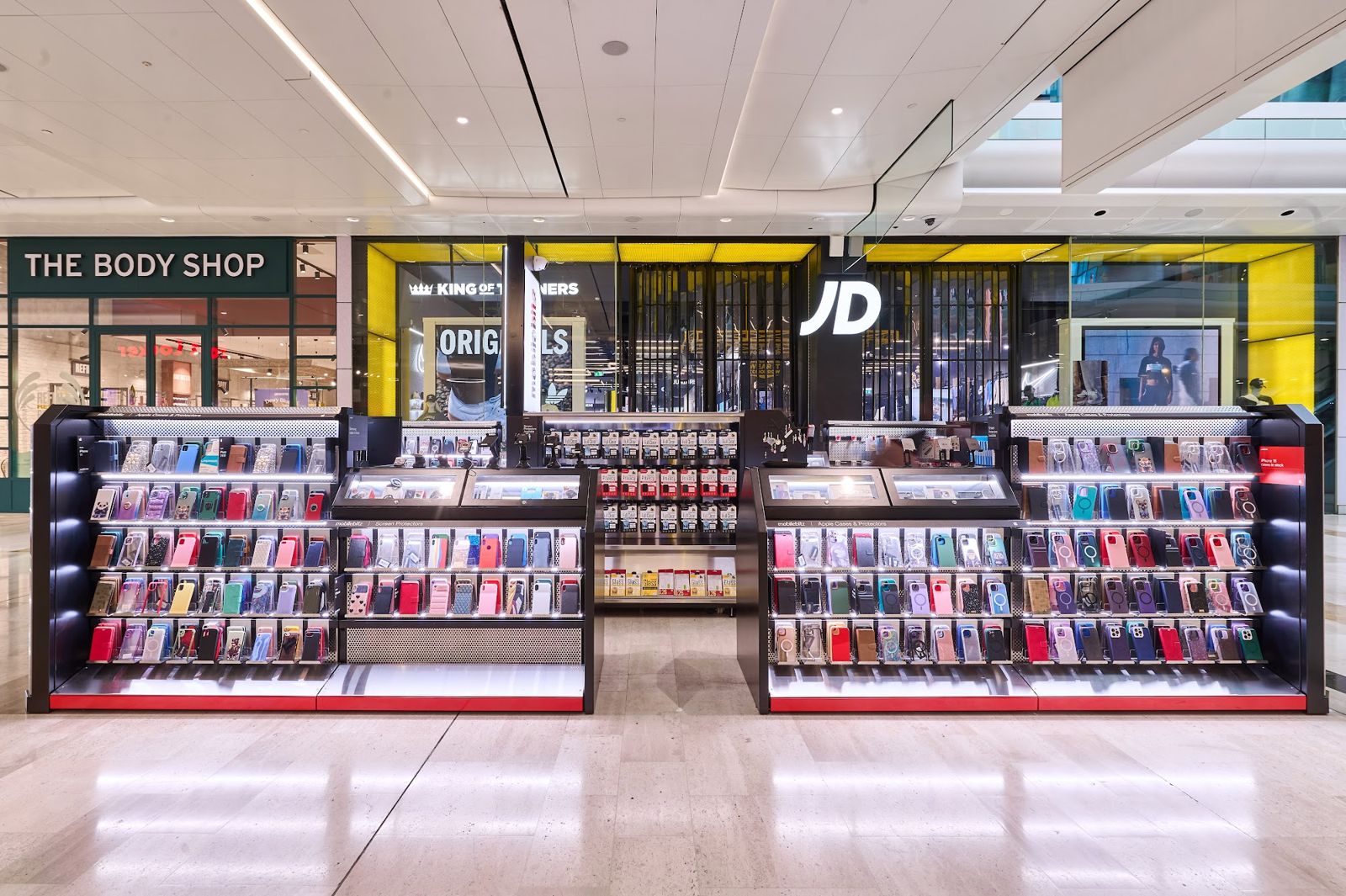 Mobile Bitz phone and tech accessories shopping centre kiosk with secure display cases by OLLYWOOD