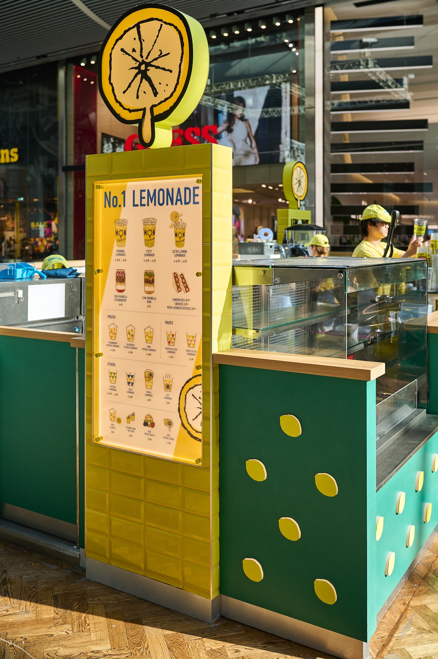 Lemonica fresh lemonade kiosk at Westfield Stratford with serving counter built by OLLYWOOD