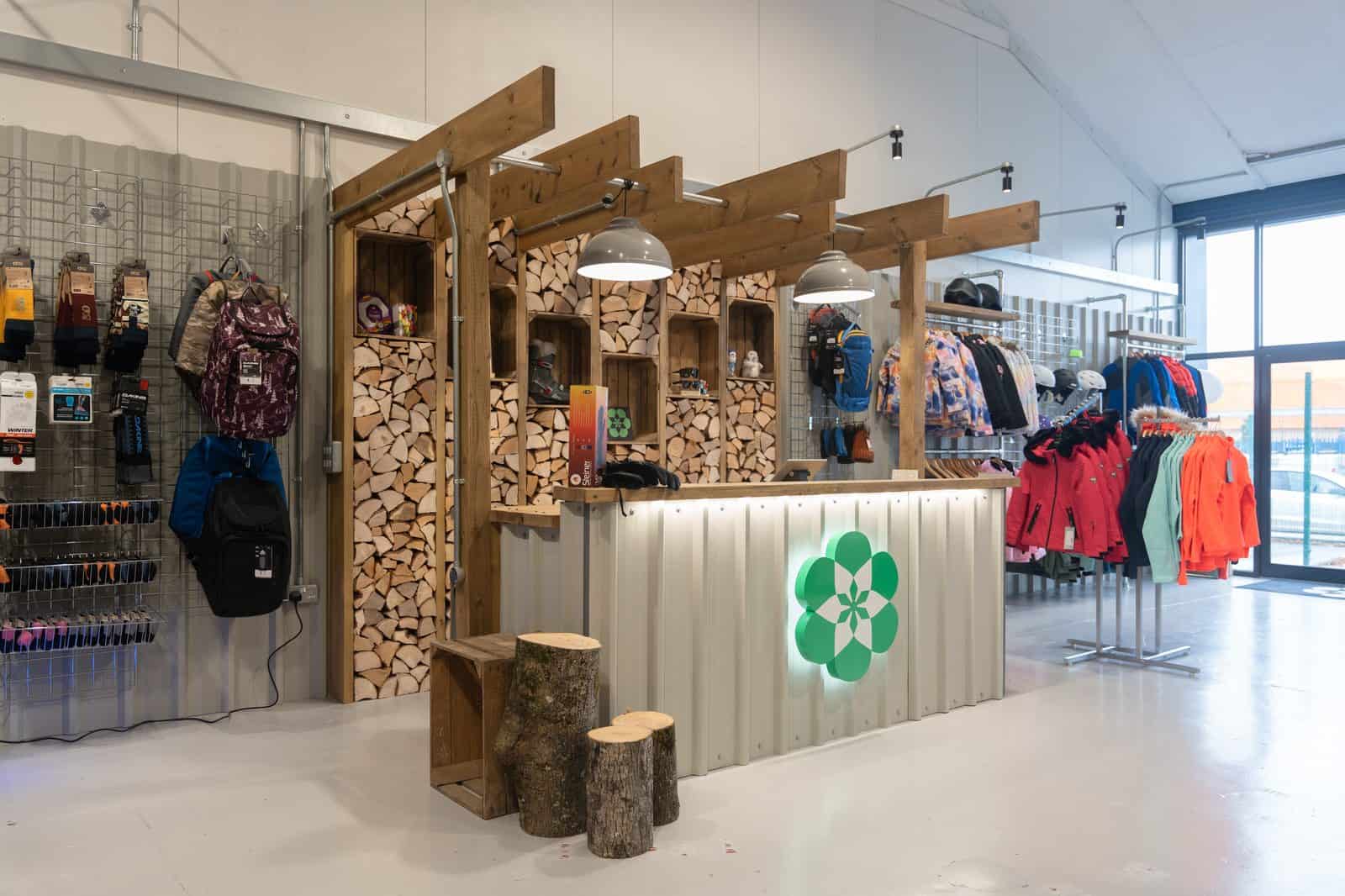 Naski Ski Shop — Log Stack Feature Wall