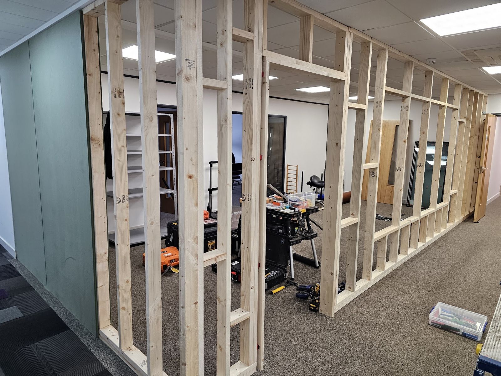 Partitions and services being built out before finishes on a fit-out