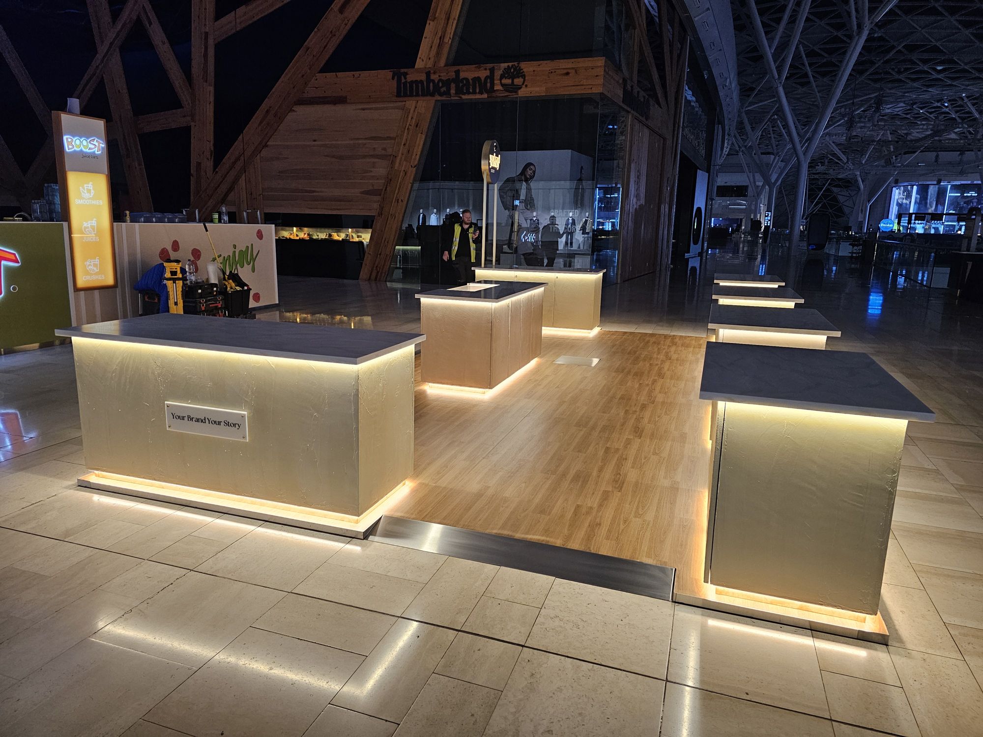 Your Brand Your Story illuminated retail pods installed mid-mall at Westfield White City by OLLYWOOD