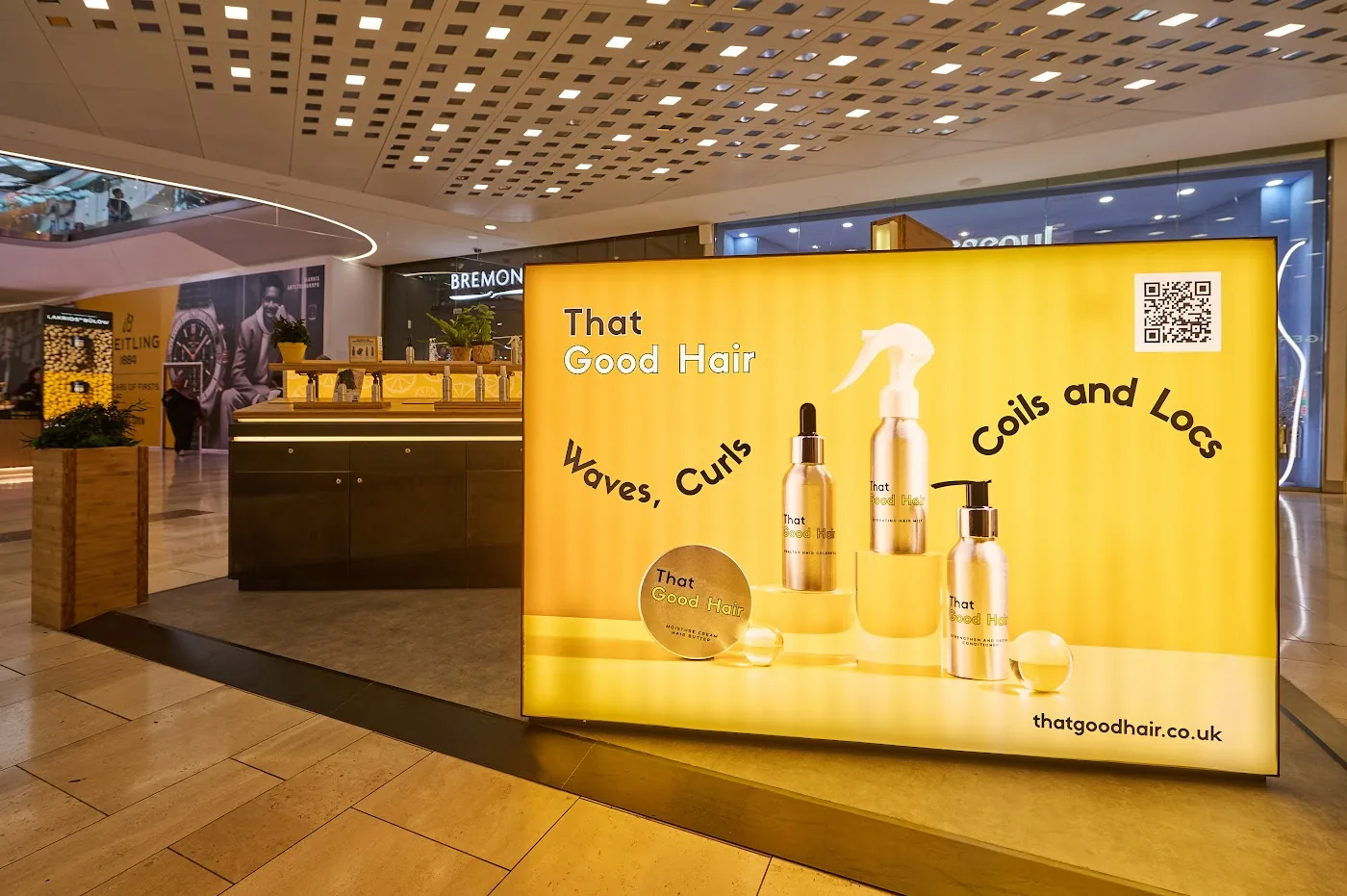 That Good Hair specialist hair product kiosk at Westfield London with illuminated lightbox front by OLLYWOOD