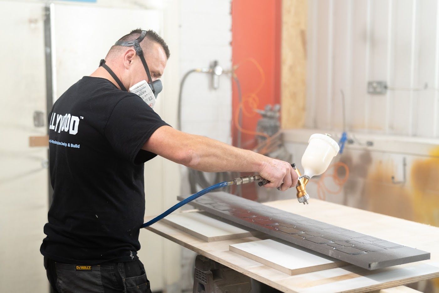 OLLYWOOD spray finishing bespoke joinery in house