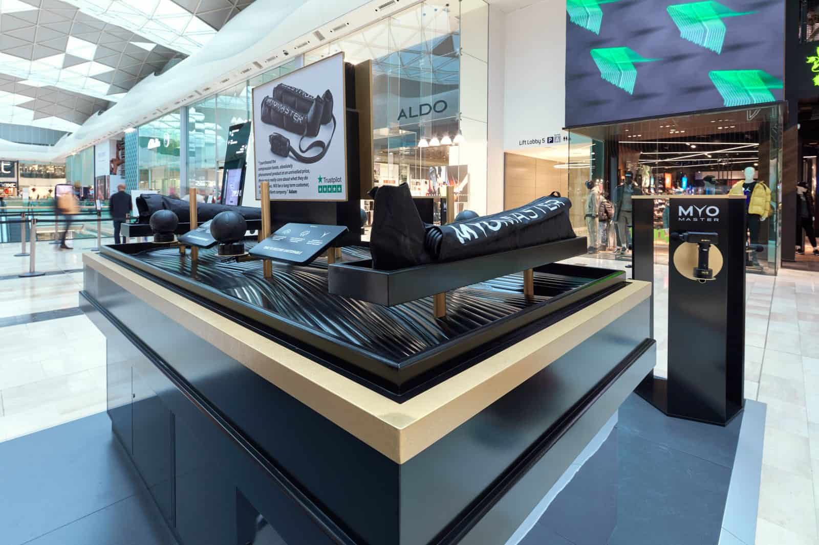 Myomaster sports recovery retail kiosk Westfield London — bespoke shopfitting by OLLYWOOD